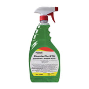Green spray bottle labeled 'CounterFlu RTU' on a white background