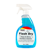 Blue spray bottle labeled 'Flash Dry' on a white background