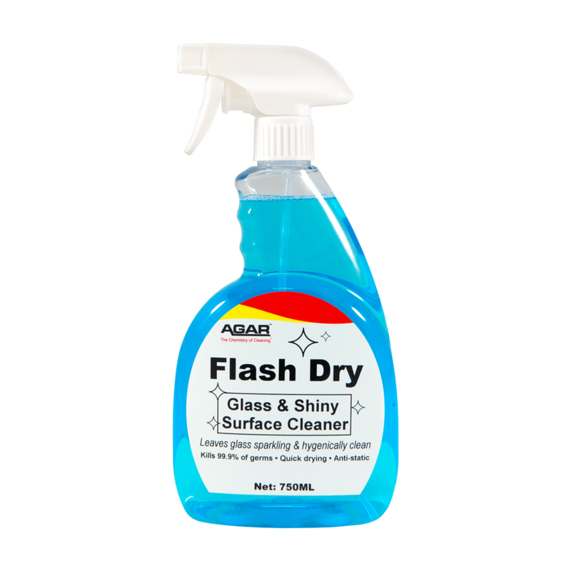 Blue spray bottle labeled 'Flash Dry' on a white background