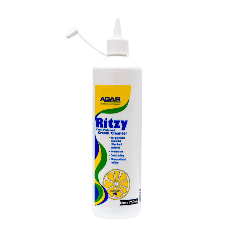 White bottle of Agar Ritzy Cream Cleanser with a yellow label on a white background
