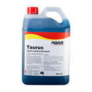 Blue and white container of Taurus liquid laundry detergent with red cap on a white background